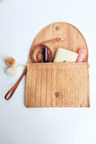 Woven Straw Clutch With Pom Poms