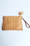 Woven Straw Clutch With Pom Poms